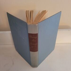 Young Mrs. Savage. Blue Hardcover Book